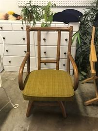 #56	Rattan Swivel Chair	 $75.00 
