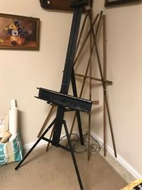 #98	Metal Easel  69" Tallx21'"W	 $75.00 
