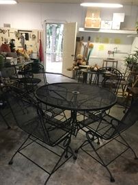 #55	(4) Bouncy Chairs w/wrought iron Black Table  	 $150.00 
