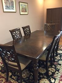 #114	Dining Table w/8 Chairs and as is leaf 	 $275.00 
