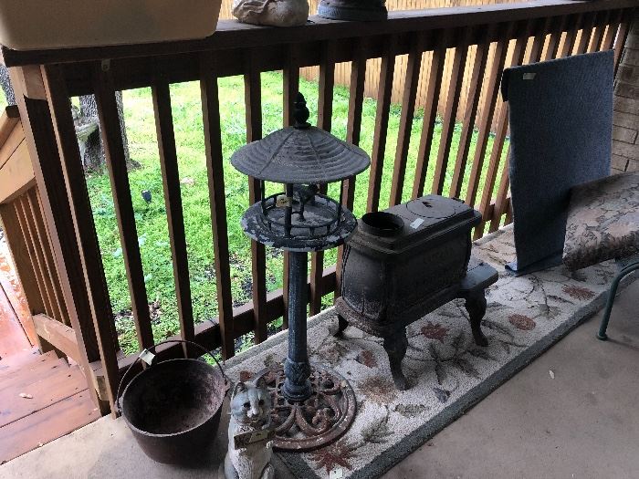 cast iron antiques and newer yard or decor items