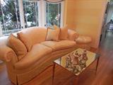 Custom sofa with mirrored coffee table with serving set