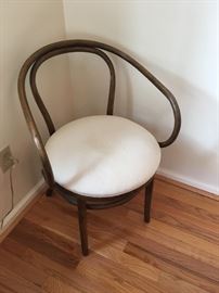 Sculptural lines define this elegant Bentwood Armchair.