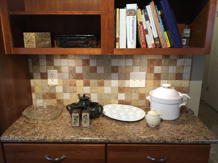 Variety of Kitchenware and Cookbooks