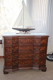 Inlaid Chest of Drawers and Sail Boat