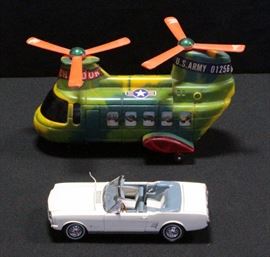1970s Battery Operated Chinnok Toy Helicopter With Deployable Tank And Danbury Mint 1966 Ford Mustang Diecast Car