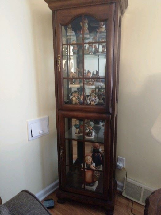 Curio Cabinet (lighted) filled with Hummels.