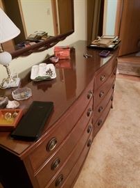 Antique dresser; antique wall mirror; hob nail repop lamps
