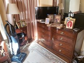 Vacuum, dresser, rug, TV, more.
