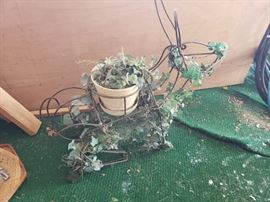 Very cute metal rabbit planter!  Larger than it looks!