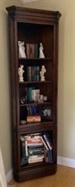 Corner book shelf.