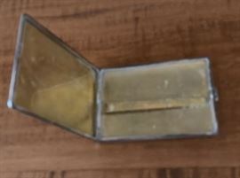 Inside of cigarette case.