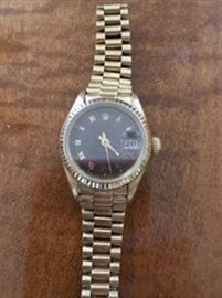 Ladies Rolex, after market 18k Italian gold band.