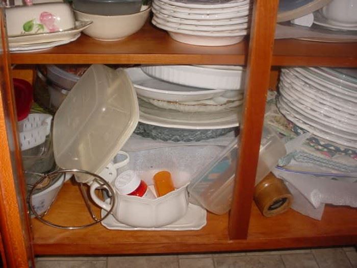 Cabinets and cabinets full and yet to be unpacked...SO MUCH vintage dinnerware