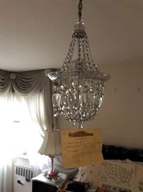 and another bedroom chandelier with an original 70 year old receipt purchased when the family lived in Brooklyn, New York