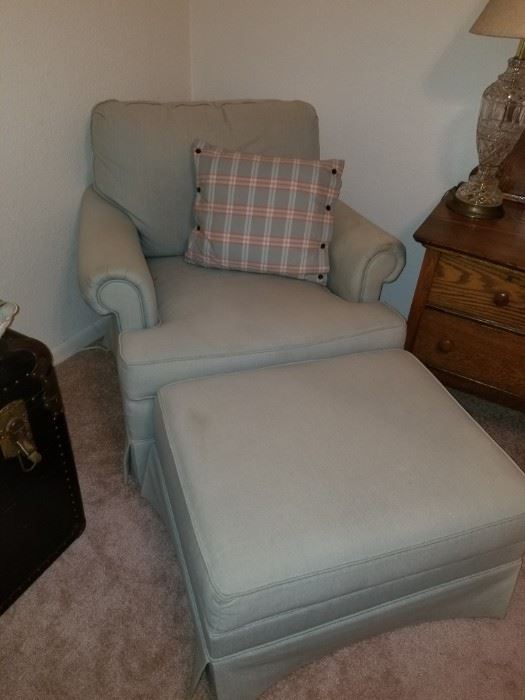 Pale blue chair with matching ottoman