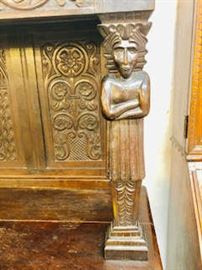 carved post on cabinet 