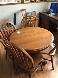 Table with leaf and four matching chairs
