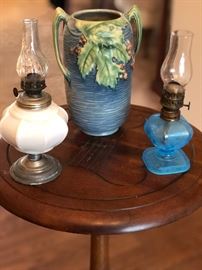 Roseville Pottery piece and glass mini oil lamps  pottery piece has been repaired.
