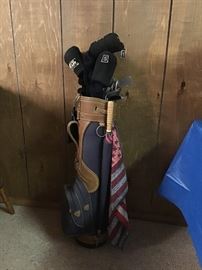 Titleist irons, Nicholas graphite woods, nice bag and accessories.
