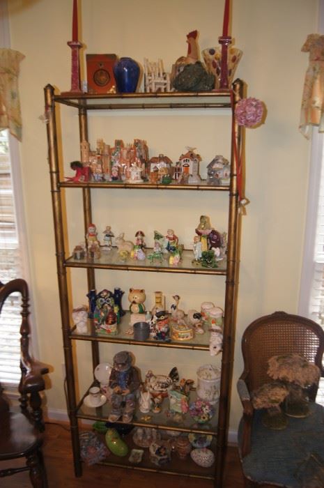 Glass display shelves unit with lots of chachkies