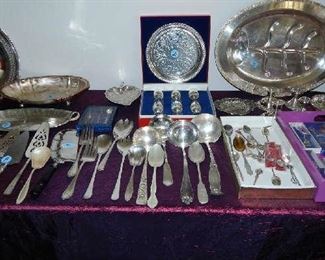 HUGE COLLECTION OF ASSORTED SILVERPLATE PIECES.