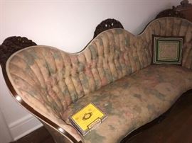 OUTSTANDING CARVING OF THIS VICTORIAN COUCH..