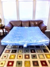Queen-size mattress inside Sleeper Sofa.