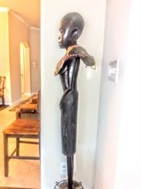 Side-view of "Makonde Tribe" sculpture.