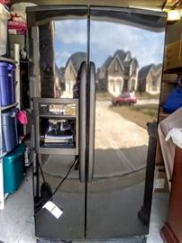 Beautiful black Double-Door Refrigerator with ice-maker.