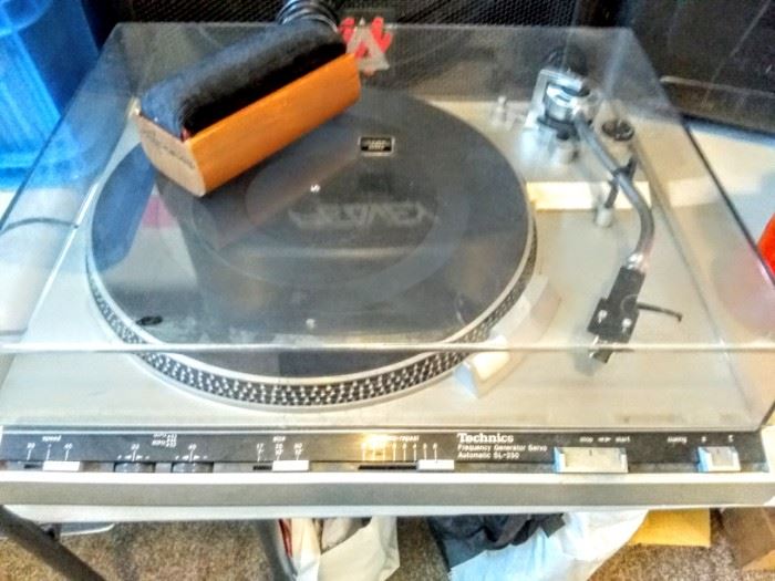 "Technique" turn-table. and soft velvet brush to clean records.