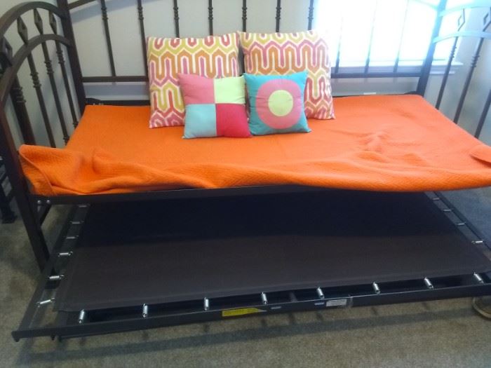 Day-Bed has bottom frame th pull-out then pull-up becomes Queen-Size bed.