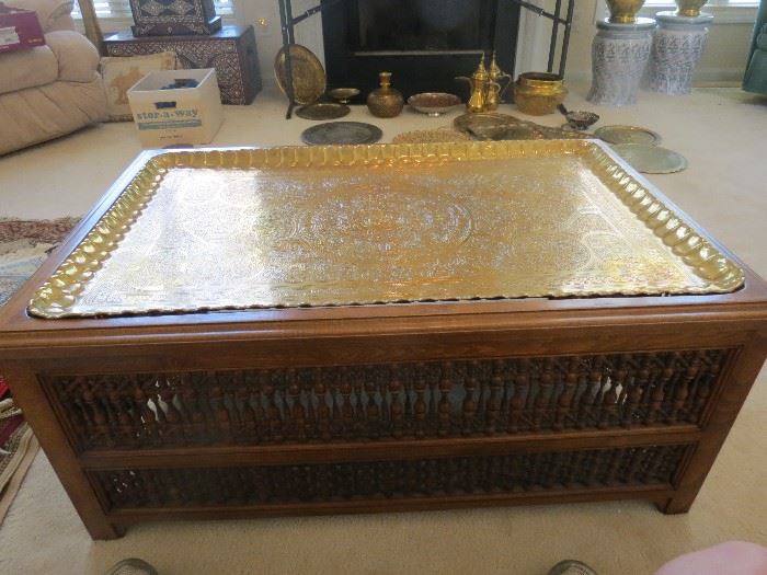 2 OF THESE BRASS TOP COFFEE TABLES.