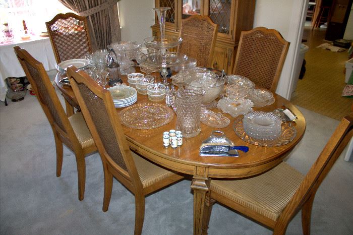 Dining table with 2 leaves, table pads, and 6 chairs