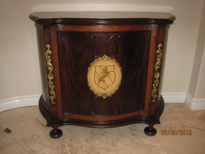 Shorter 1930's Era Cabinet with Lion Crest Available for Immediate Purchase as a Set. Asking $9,000.00 for All Pieces 