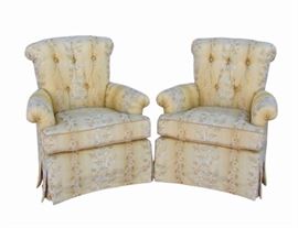 Beacon Hill Silk Bouquet Swivel Gliders.  Elegant yet supremely comfortable swivel glider chairs upholstered in a fine Beacon Hill goldenrod silk featuring a linear vertical bouquet pattern with a touch of sage green and off-white fabric. Tufted back with silk covered buttons, rolled arms, split skirt and trimmed in woven sand and gold lip cord. Loose, removable seat cushion is two-sided and filled with polyurethane wrapped in dacron and have zippers for easy removal and cleaning. These chairs sit firmly, slightly low and have a high enough back to rest one’s head as you glide into total relaxation.
Dimensions: 33”w x 33”d x 36”h • Seat=19”h • Arm=24”h
Condition: In beautiful condition – ever so slight wear on the silk in a few places. Chairs appear slightly lighter in the photos than in person.
