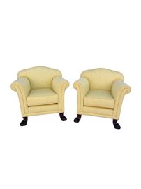 Antique Lion Paw Club Chairs.  Beautifully upholstered in a fresh lemon silk cotton blend ribbed fabric featuring a geometric diamond overlay design and single self welt detail. Chairs are extremely comfortable and sit firm and snug with excellent back support and perfect arm height. Rolled arms and a slight camel back give these pieces a smooth line. Carved lion’s paw feet in front and peg legs in back. Cushions with zippers for easy removal and cleaning are filled with polyurethane latex foam that will keep their shape nicely for years to come!
Dimensions: 34”w x 31”d x 33”h Seat=20”d x 18”h Arm=27”h (74.5lbs each)
