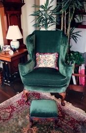 George I Walnut Wing ChairW-012/C-29
A George I walnut wing chair with an elegantly scrolled outline emphasizing the wings and
connected arms. The chair is supported on two cabriole legs of good, rich colour with pad feet
and carved shells to the knees. The rear legs are of beech with a softly scrolled cabriole
Profile.
English, circa 1725
Height: 42 inches (107 centimetres)
Width: 33 inches (85 centimetres)
Depth: 30 inches (76 centimetres)

Note: *New Fabric: Hines-Velluti/Green *Nail Heads: Original Brass *Original Horsehair Stuffing
The English wing chair evolved from continental examples during the latter half of the seventeenth
century and thereafter the design was continually refined, walnut framed examples of the first half of
the eighteenth century often having the most beautiful shape and carved decoration.