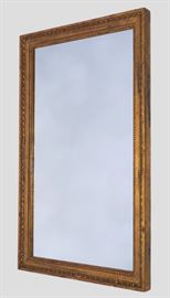 Rectangular Gold Ribbon Mirror                                  Details: Vintage wood and gesso rectangular gold mirror featuring a ribbon motif around the exterior
and beaded design on the interior edges. Finish is distressed and has red and black accents. Original
metal reinforcements around corners and antique nails hold the frame together. Hangs vertically or
horizontally with wires in place for both options. A versatile piece with a bit of age, adding character to
any room!
Dimensions: 24”w x 2”d x 39.75”h (22lbs)