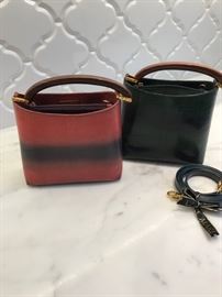 Lana Marks bags, Rose with Purple Bel Air bag with Wooden handle (left) and Green with Blue bag with wooden handle (right). 