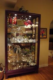 Chocolate Curio Cabinet with sliding door.                                     Dimensions: 46"l x 15"d  x 83"h (281lbs)