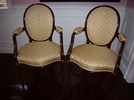 Pair of George III Mahogany Armchairs                                       English, CIRCA 1780, 38"h x 24" w x 21" d.               Notes: New fabric from Lelievre Paris, 100% Silk from Old World Weavers, Trim is Houles Montespan Braid, has original stuffing. 