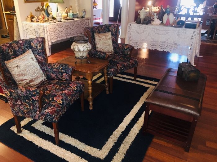 chairs, rugs, end tables, leather bench