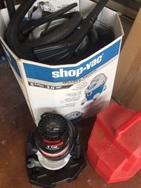 many tools including this shop vac and Router