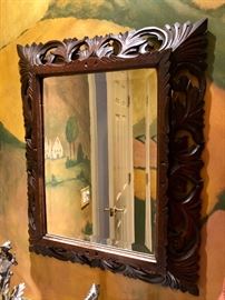 Carved walnut mirror