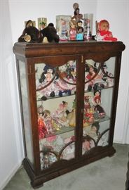 Doll Collection in an Art Deco Veneer Curio Cabinet