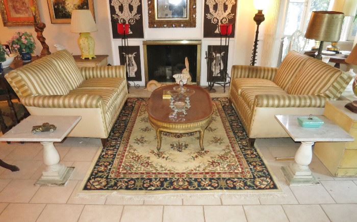 Pair of Billy Haines-Style Loveseats; Pair of Hollywood Regency Marble-Top Pedestal Tables; Oval Mid-Century French Provincial-Style Coffee Table
