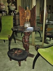 Black Marble Pedestal Table w/ a Carved Wood Cherub Base; Victorian Needlepoint Footstool; Antique Mexican Carved & Painted Santo