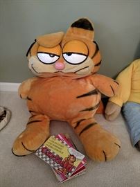 Large Garfield with books and tons of other smaller Garfields not photographed