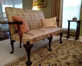 Chippendale style upholstered open arm settee